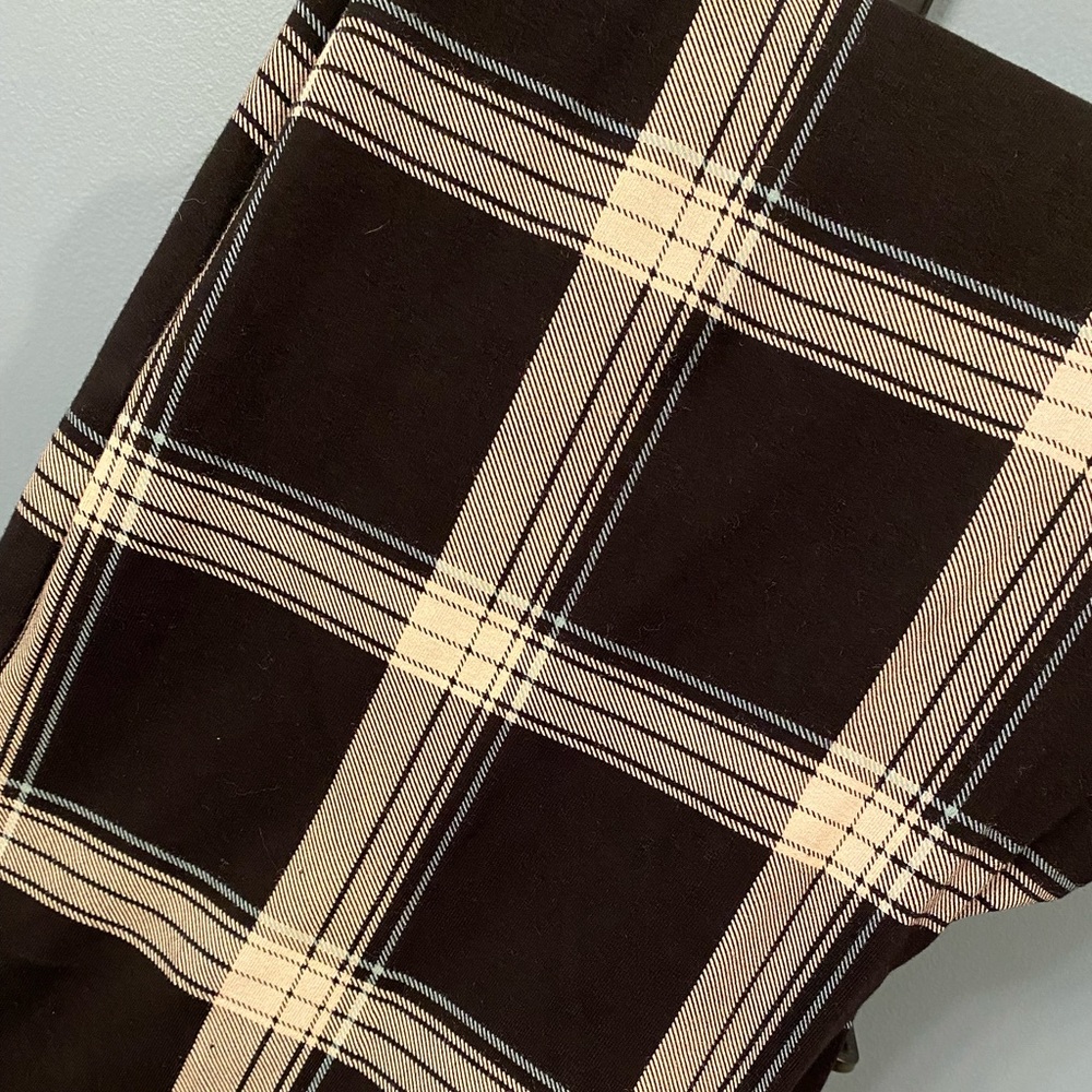 Torrid plaid leggings. Black with tan and aqua blue details. Size 3. NWT